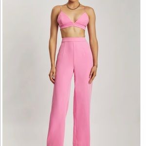 Pink strength leg trousers . Designed in Australia .